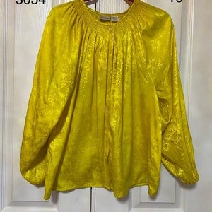 Two bundled blouses. Bright orange and Bright Yello